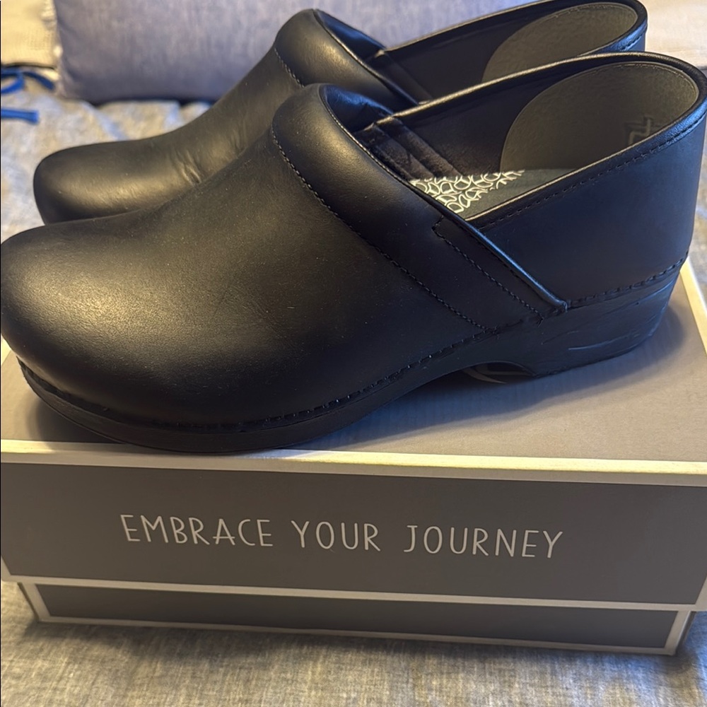 Dansko Men's Black Clogs